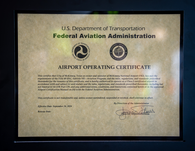 McKinney National Airport representatives with the Airport Operating Certificate